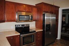 Custom Kitchen with Avonite Countertops, Armstrong Cabinets, and Armstrong Linoleum Flooring